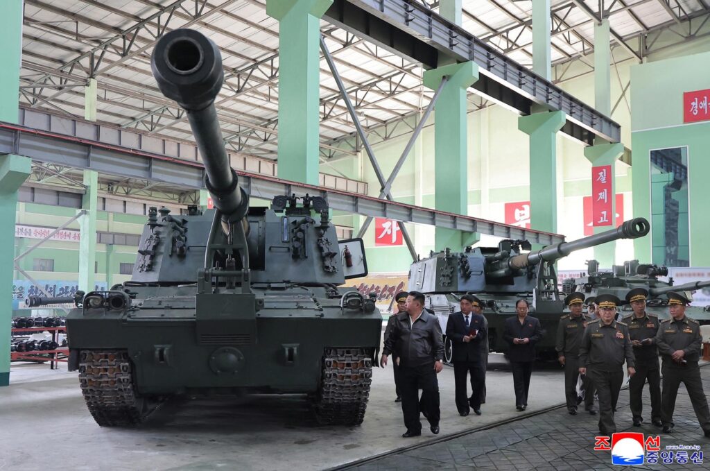 Kim Jong Un inspecting artillery factory